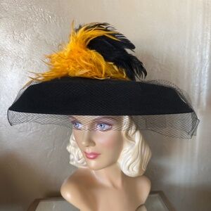ASTOUNDING BLACK FELT WIDE BRIM HAT WITH BL;ACK & YELLOW FEATHER S